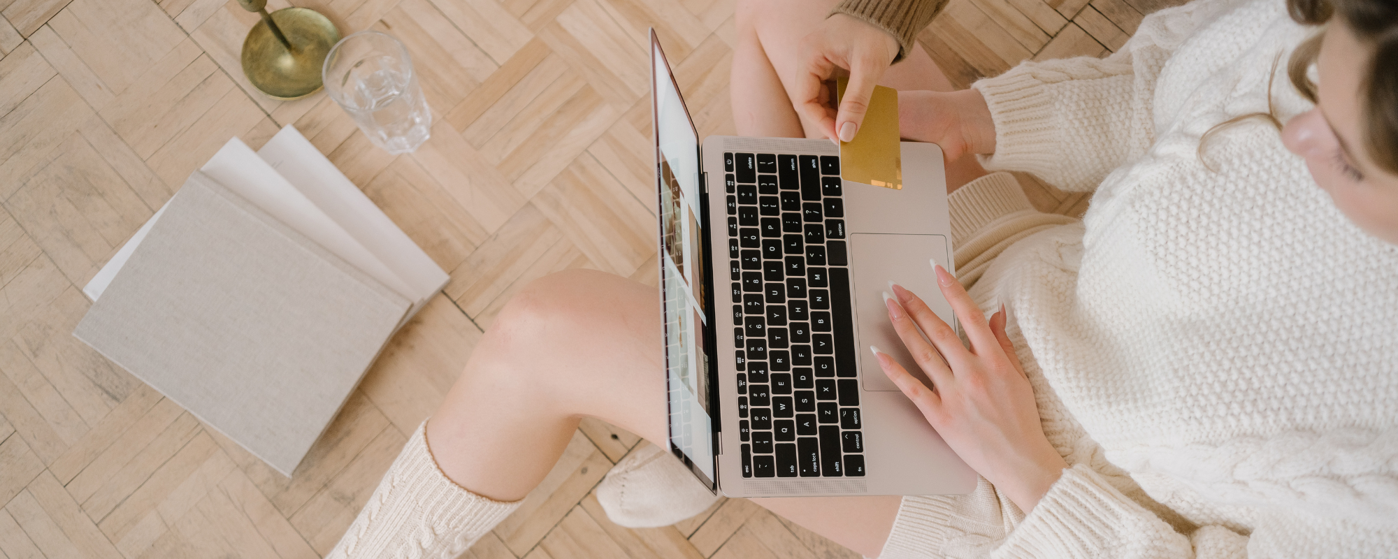 A woman online shopping during Black Friday – Impressions Vanity Co.