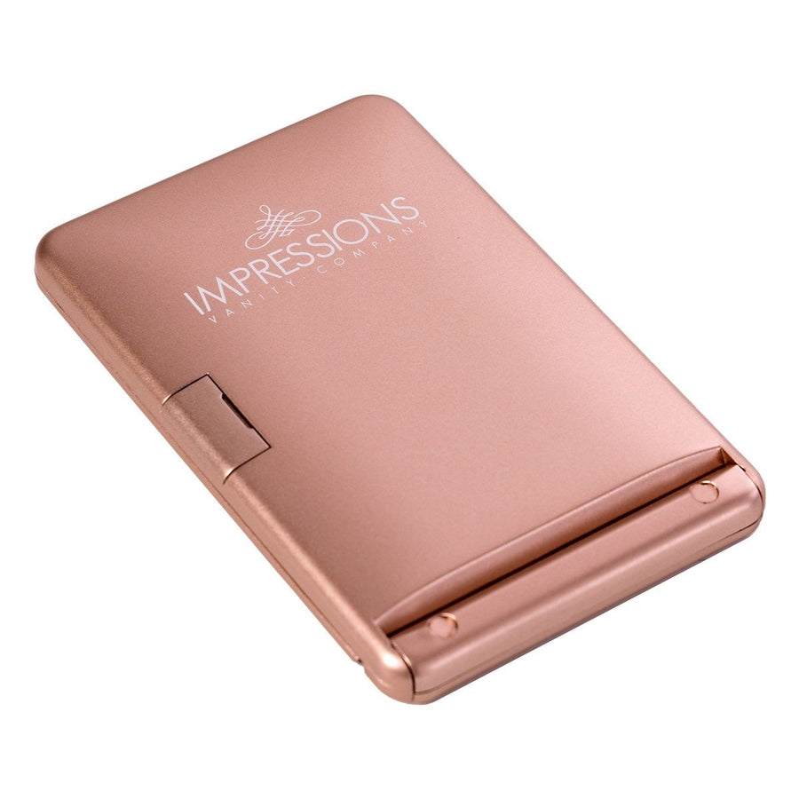 Impressions Vanity TouchUp Dimmable LED Makeup Compact Mirror in Rose Gold Folded